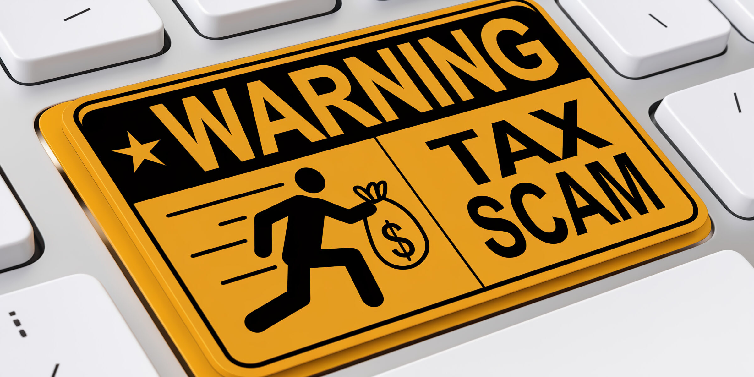 Yellow warning sign on keyboard key, depicting tax scam alert with running figure and money bag, symbolizing online financial fraud prevention