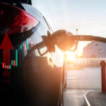Pumping gas fuel car at oil station. Woman hand refuel petrol nozzle tank. Refueling transportation and Automotive industry.