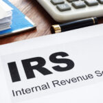 IRS Internal Revenue Service documents and folder.