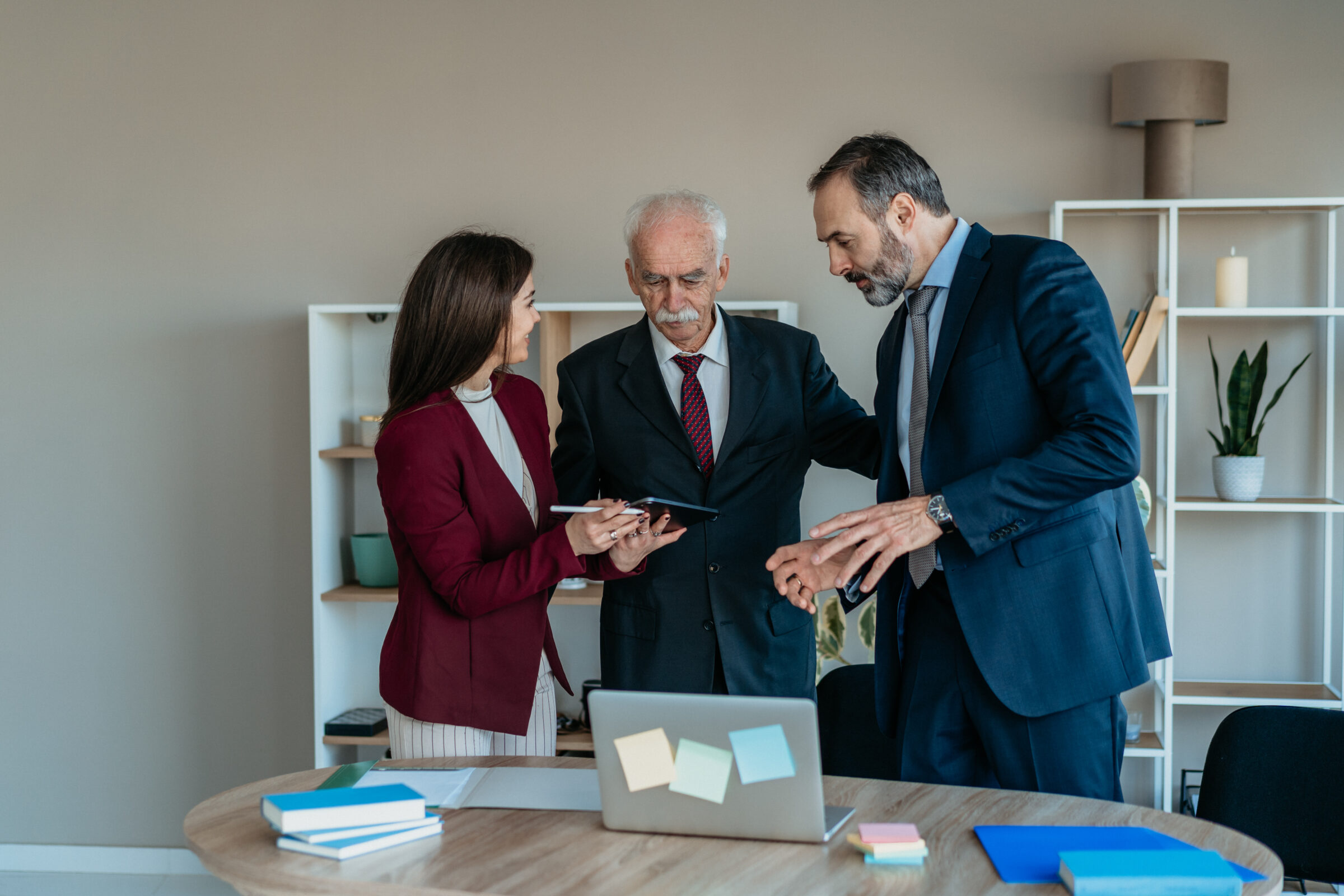 Senior Businessman with Son and Daughter in Modern Office – Family Business Transition